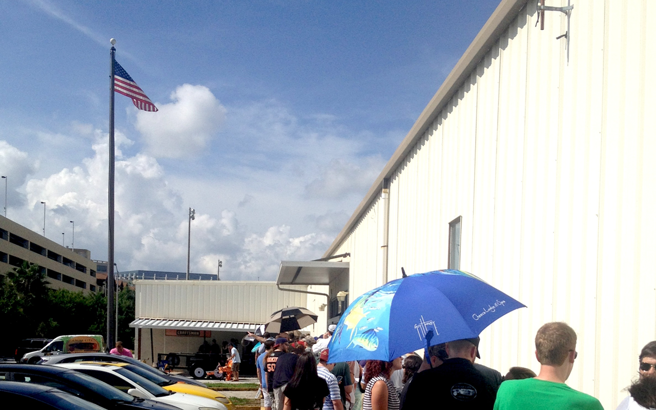 GET IN LINE: People lined up nearly 10 hours early to get their membership cards
 for Cigar City’s El Catador Club.