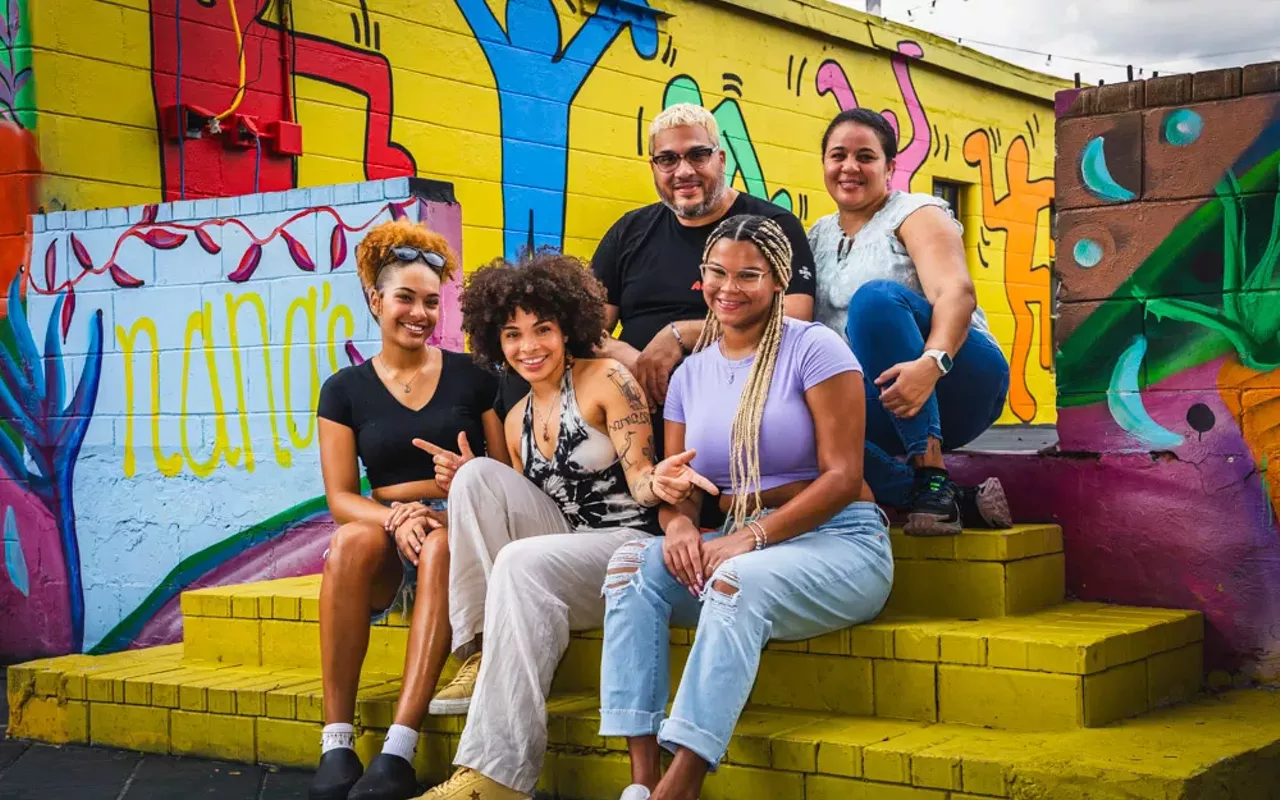 Anisa Mejia (center-front), chef-owner of Nana&rsquo;s Juice Bar & Restaurant with her team in Ybor City, Florida on July 28, 2023.