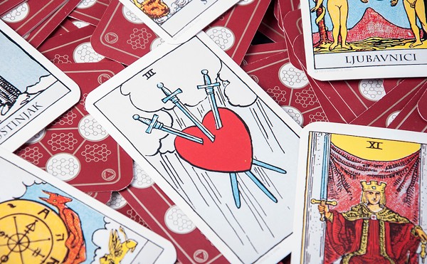 The Three of Swords, a card of heartbreak and grief.