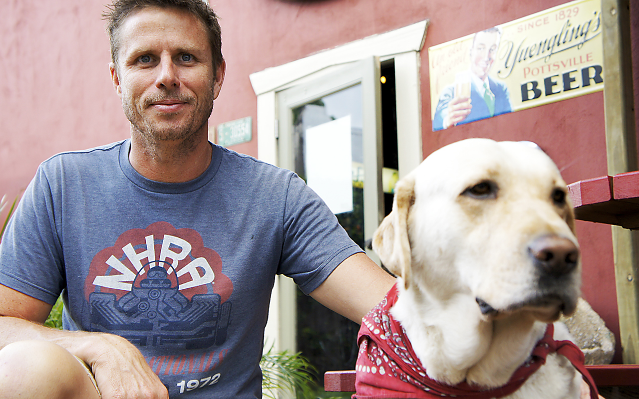 GOOD OLE BOY: Gabel with his dog Bob Barker outside of Cappy’s in Seminole Heights.