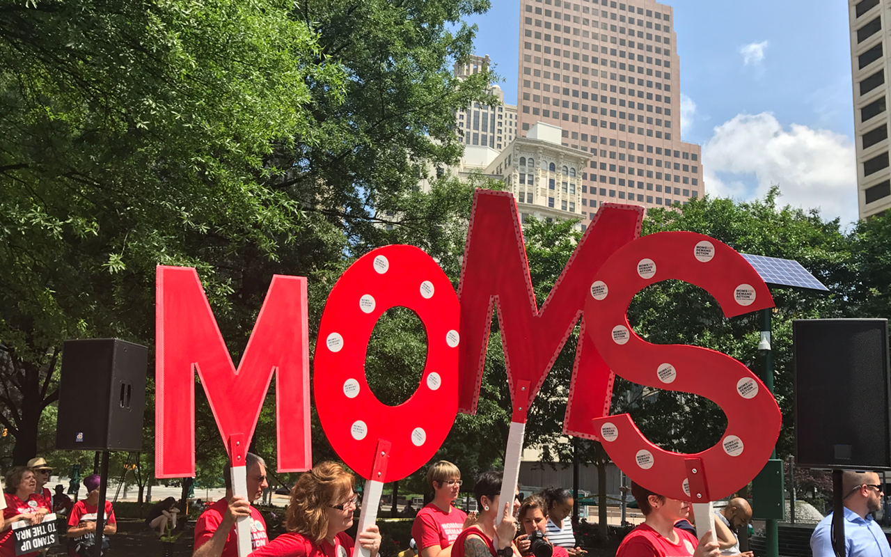 Activists from Moms Demand Action, an organization that pushes for tougher gun laws.