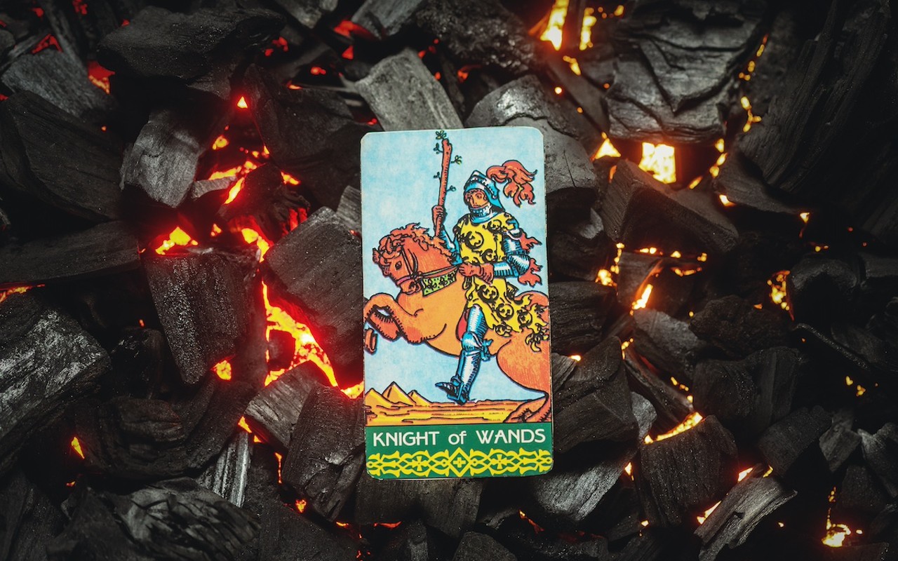 The Knight of Wands is a fiery figure.