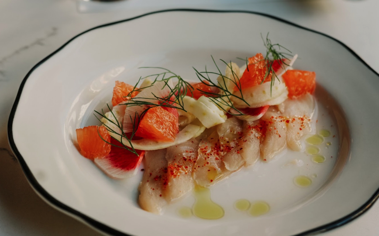 Willa's has specially-curated dishes including snapper crudo with espelette, watermelon radish, grapefruit supreme, pickled fennel & EVOO.