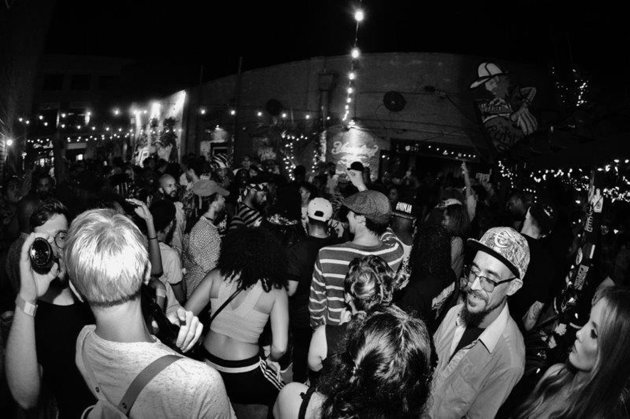 Photos of DJ Izm and DJ Wonder rocking for Ybor City's Ol' Dirty Sundays at Crowbar