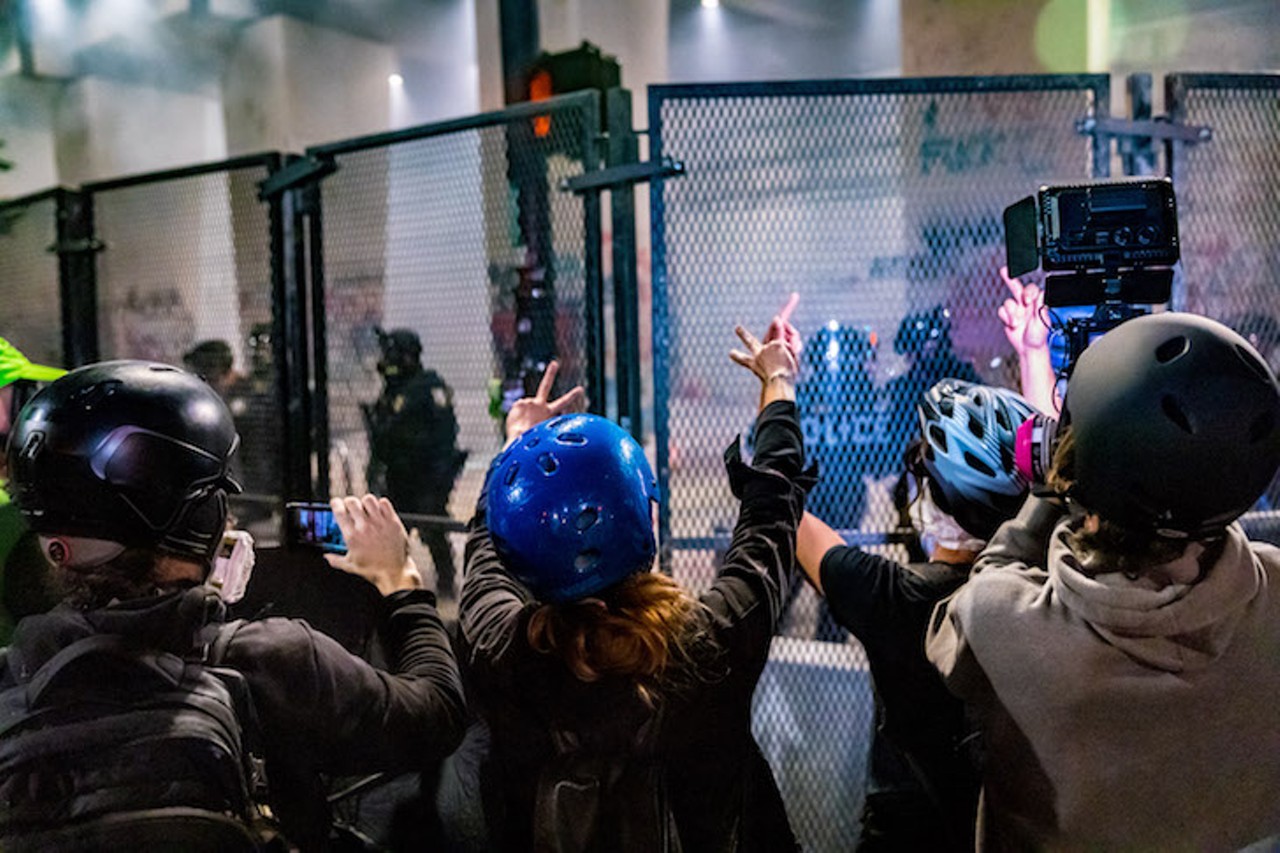 Photos of Portland protesters facing off with federal storm troopers