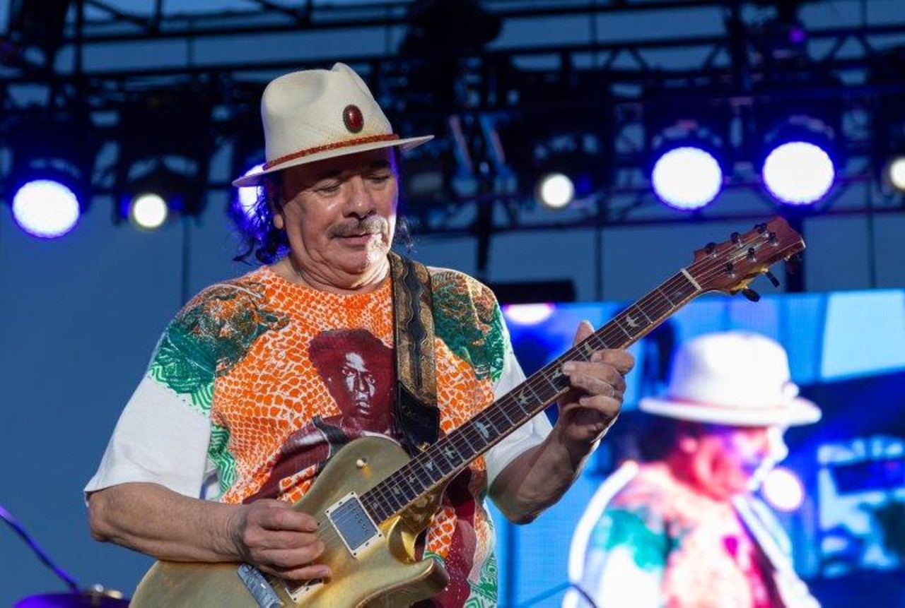 Photos of Santana making a serious guitar face at St. Petersburg's Al Lang Field