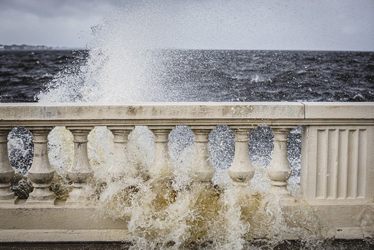 Waves crash on Bayshore Boulevard in Tampa, Florida on Sept. 26, 2024.