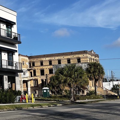New construction and historic cigar factories in West Tampa, with the A1A Tampa Bay headquarters in the distance.
