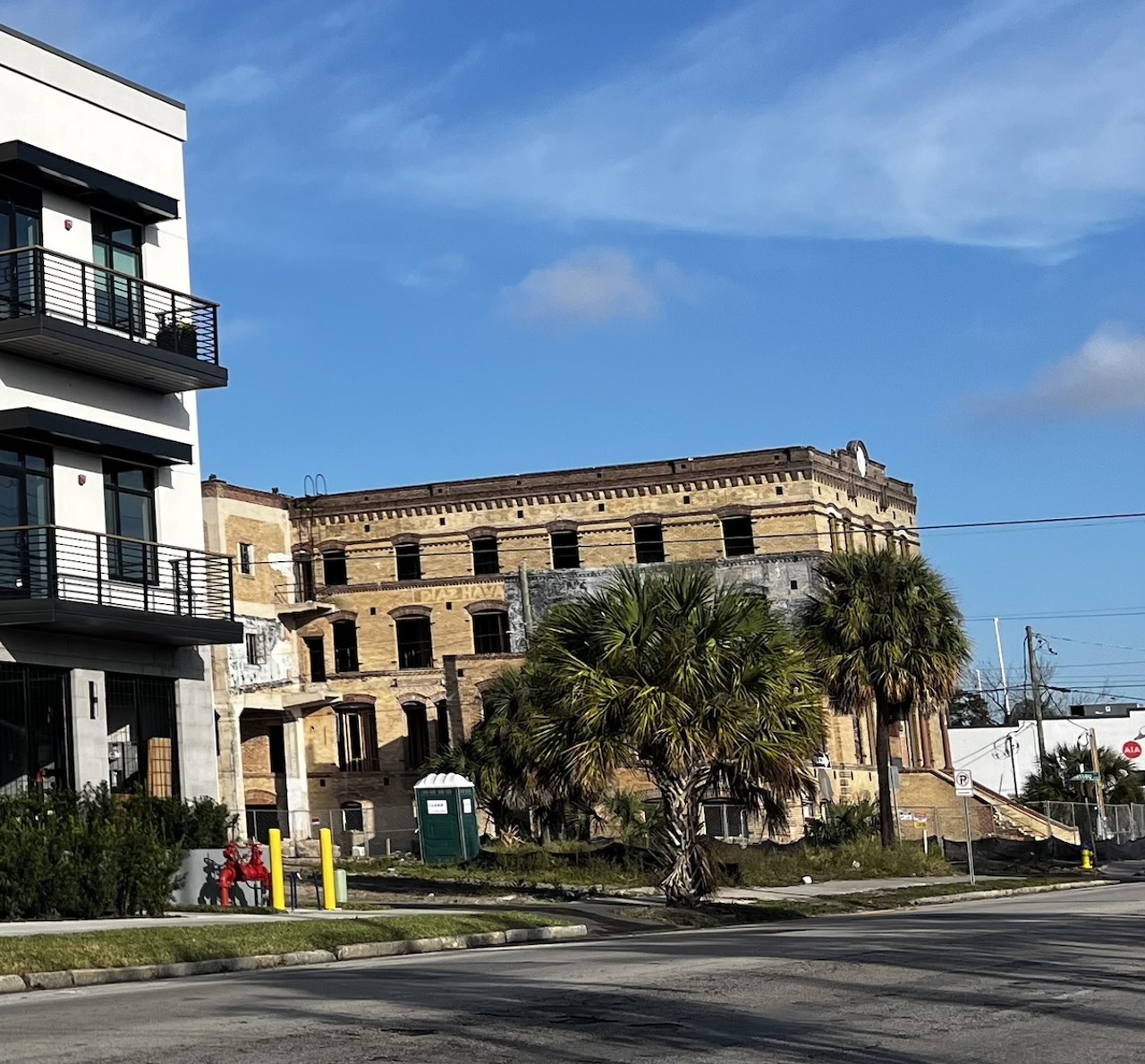 New construction and historic cigar factories in West Tampa, with the A1A Tampa Bay headquarters in the distance.