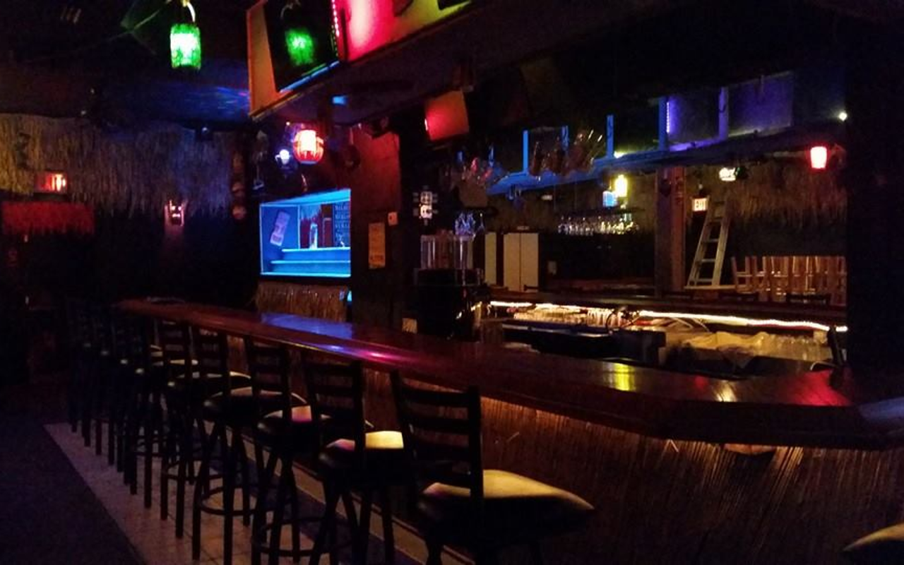 A view of Red Tiki Bar's low-lit bar area.