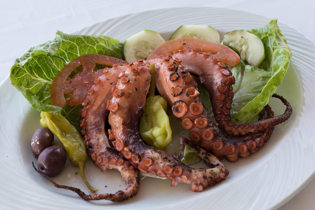 Among the entrees, grilled octopus arrives with fresh herbs
and lemon olive oil sauce.
