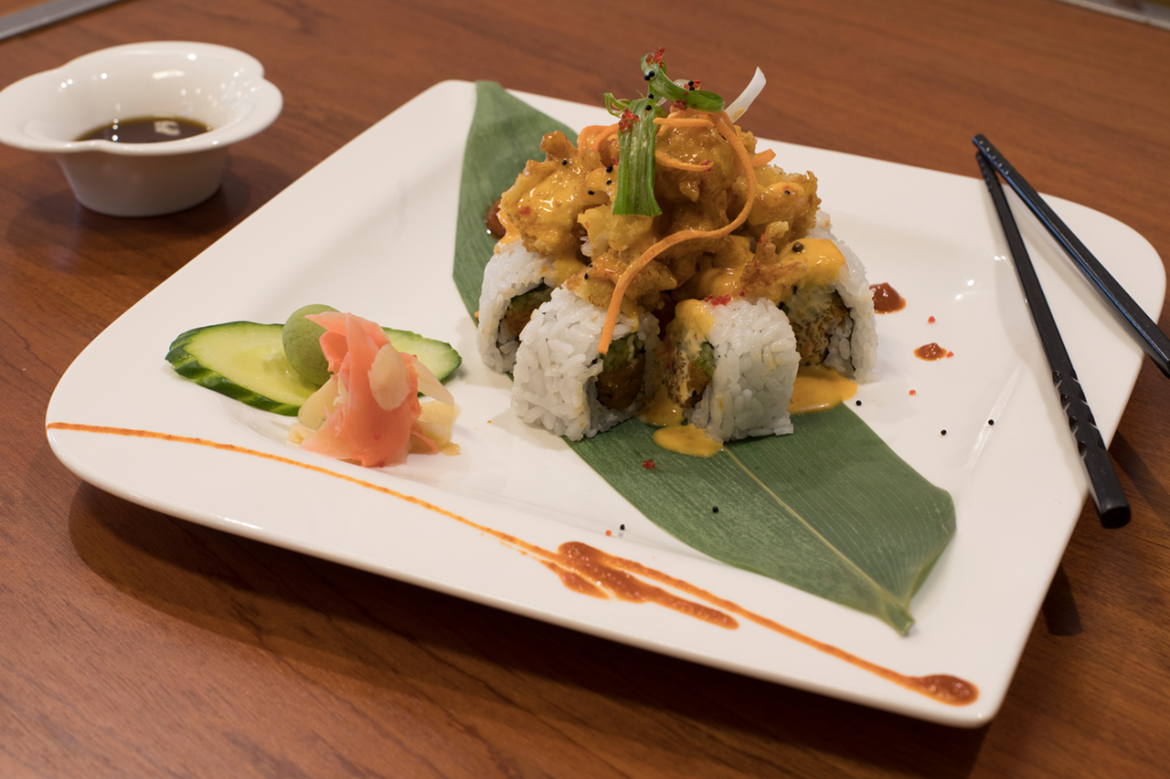 The Velvety Shrimp sushi selection features the signature ultra-crispy shellfish piled on top of a spicy tuna roll.