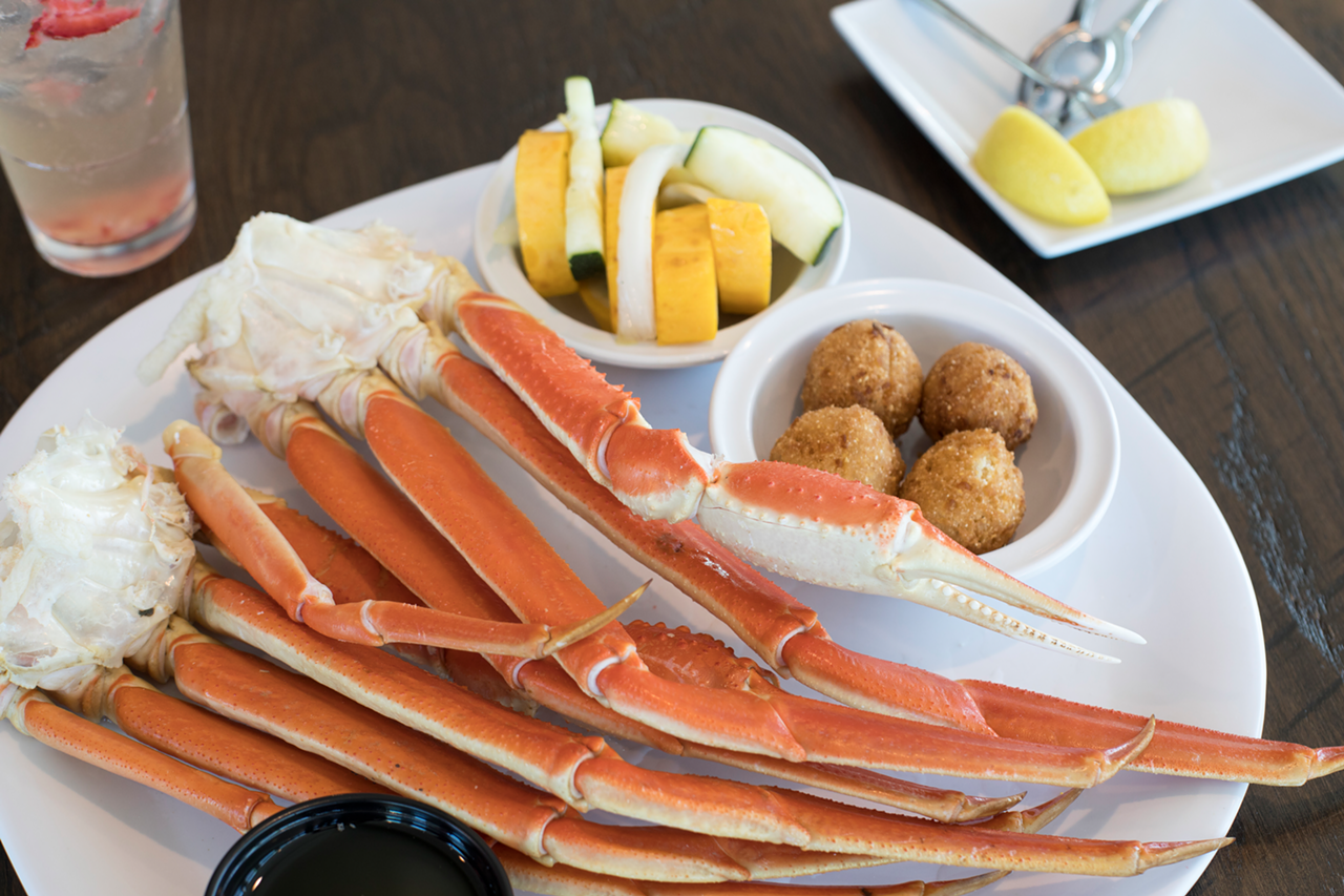At Crabby's Dockside, steamed bairdi crab is a house favorite, served with seasonal veggies and hush puppies.
