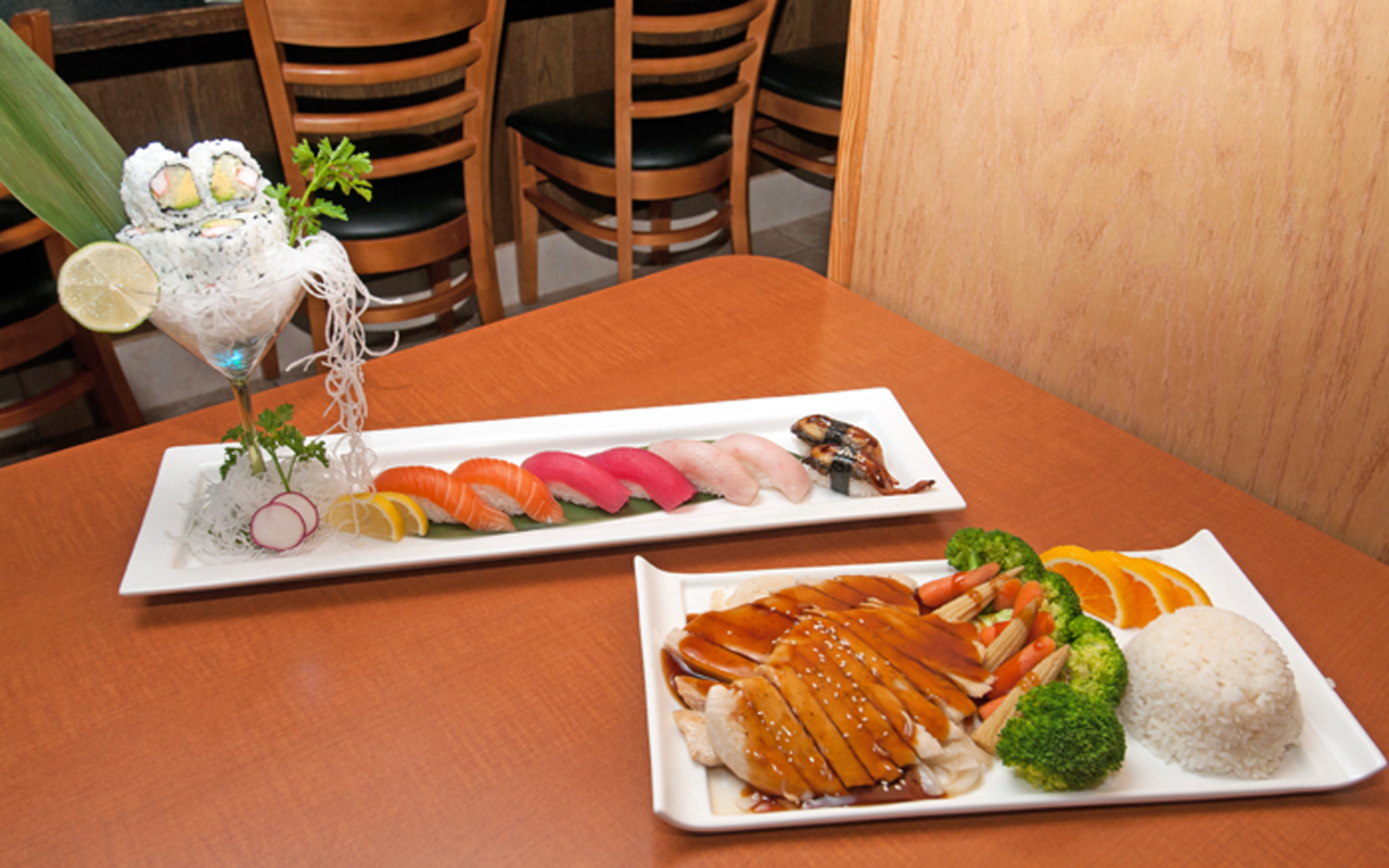 VISUAL STUNNER: Volcano’s artful Jumbo Sushi alongside chicken teriyaki.