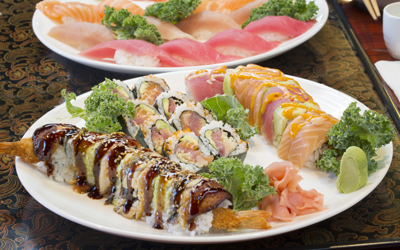 ON A ROLL: Kaiko's sushi platter with dragon, Scott and Christine rolls, and nigiri peeking through the background.
