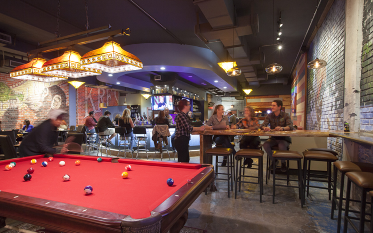 Two pool tables, wall-length murals and more get your attention at The Lure.