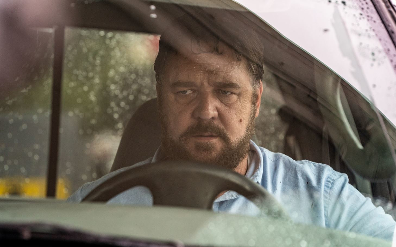 The Man (Russell Crowe) just murdered a family and got away with it. Imagine what he will do when you honk at him.