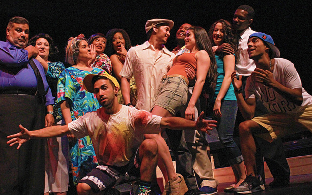 Jorge Acosta (left) and the rest of American Stage's In the Heights cast.