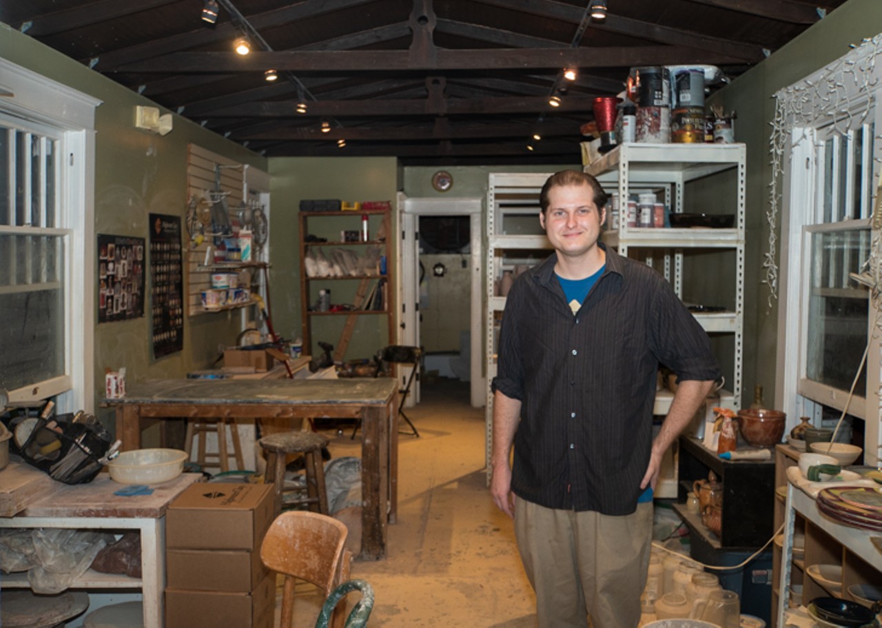Craftsman House's artist-in-residence, Adam Addison, in the studio out back.