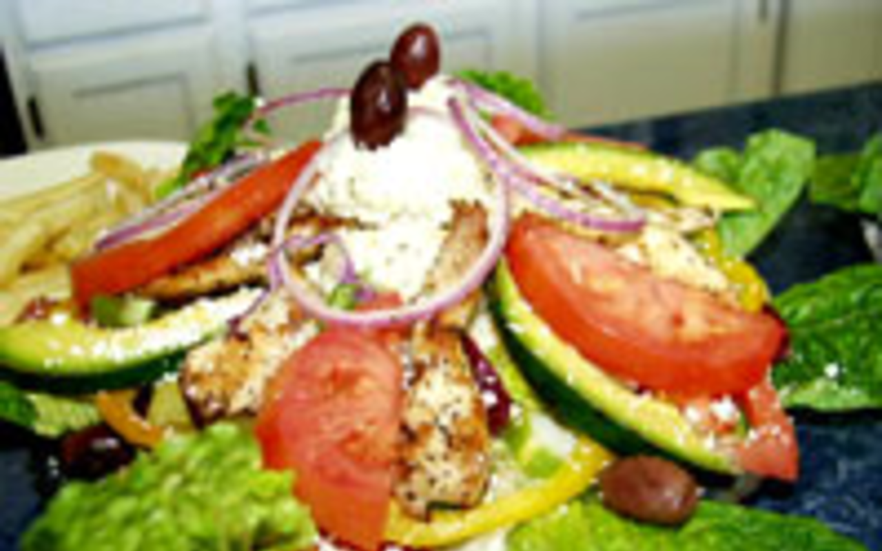 TARPON SPRINGS-STYLE: Maria's colorful Greek 
    salad, with the all-important scoop of potato salad.