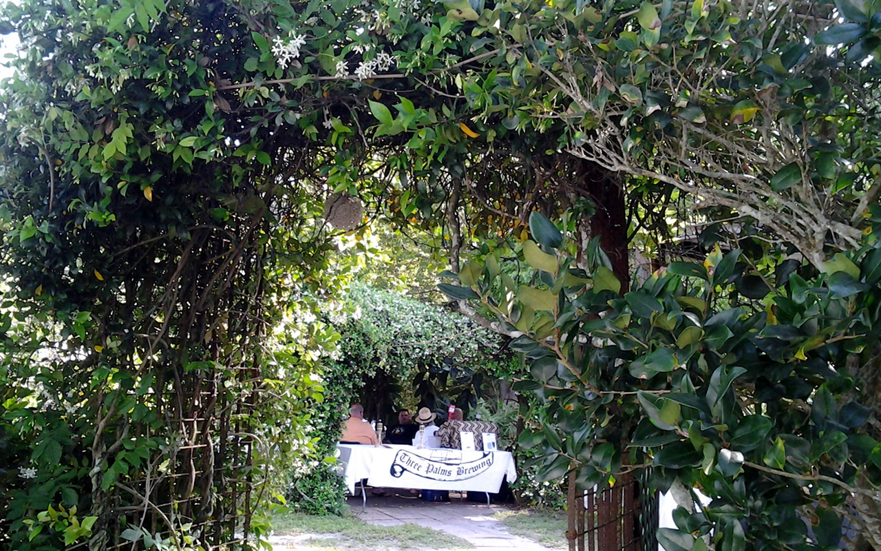 Pearl in the Grove's archway of tangled greenery that welcomed about 115 diners to Swinefest No. 2.