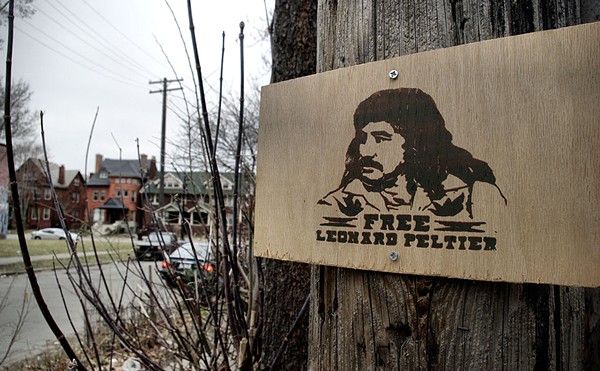 'Free Leonard Peltier' sign in Detroit, Michigan.