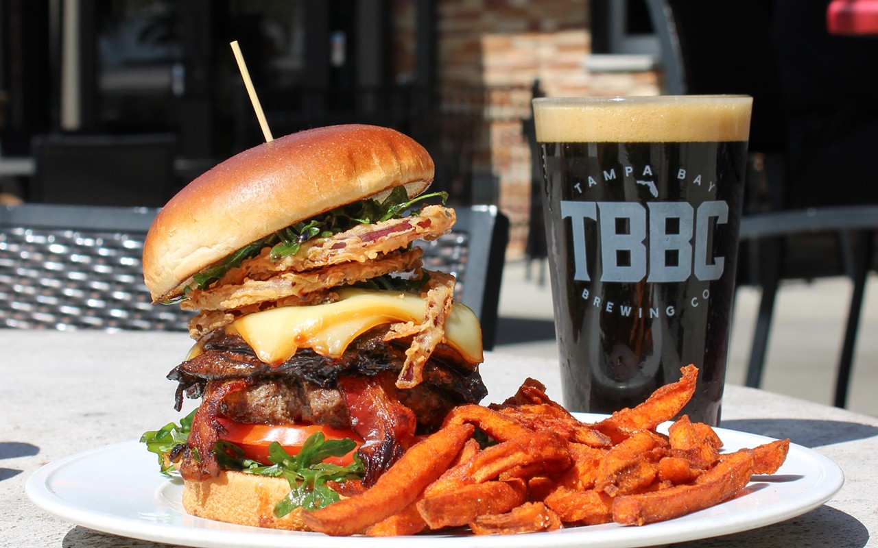 TBBC Westchase's 'The Carnivore' burger complete with a 5 oz. wagyu patty, grilled portabella mushrooms, bacon and hickory-smoked gruyere.