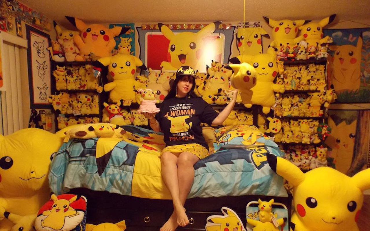 Belle Starenchak sits in her “Chuseum” of more than 22,000 Pikachu items. The collection has a Guinness World Record.