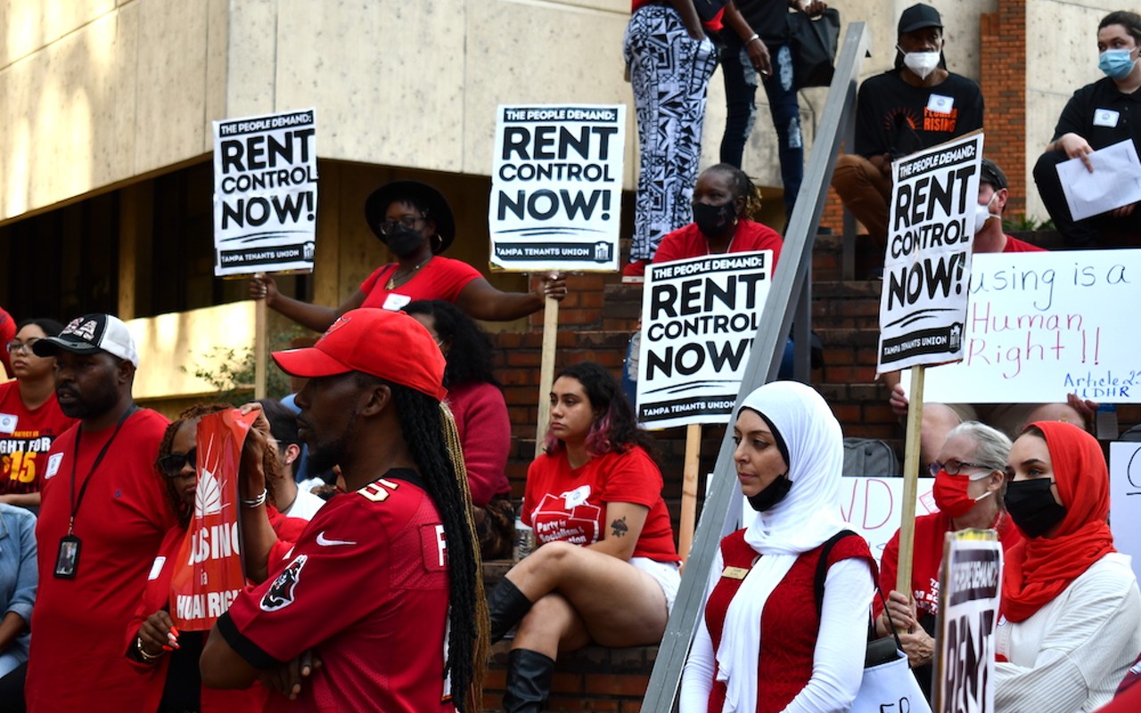 Protesters outside of Tampa City Hall call for rent control.