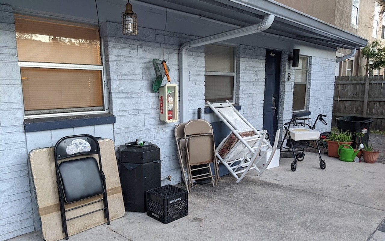 A family's belongings sit outside of their unit at Holly Court Apartments in Tampa, where tenants are currently being evicted.