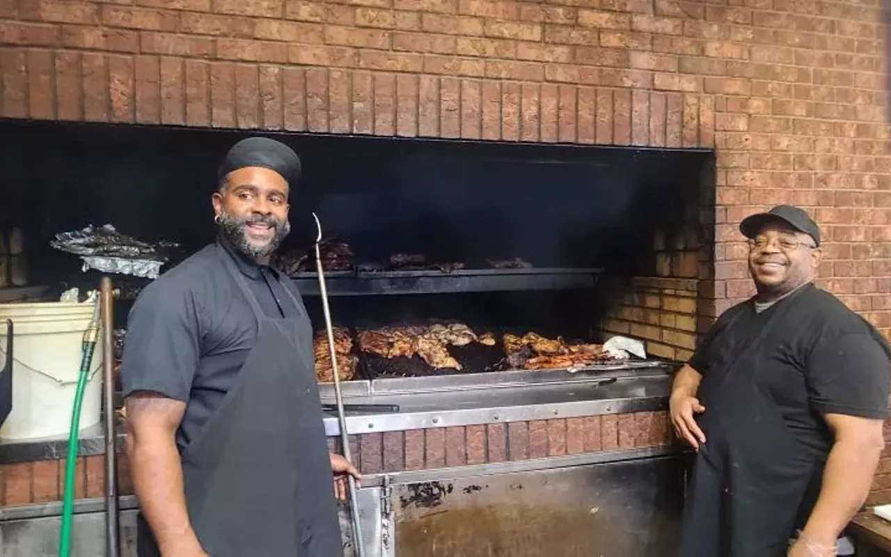 Corey Miller (L), pitmaster at Big John's Alabama BBQ in Tampa, Florida.