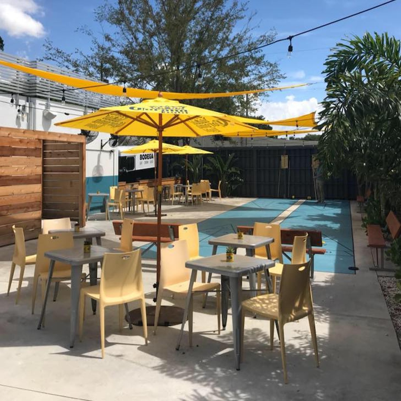 Bodega  
Multiple locations, 727-623-0942, 813-533-3333
Nestled in the bustling Edge District and in Seminole Heights, Bodega was destined for killer outdoor seating. 
Photo via Bodega/Facebook