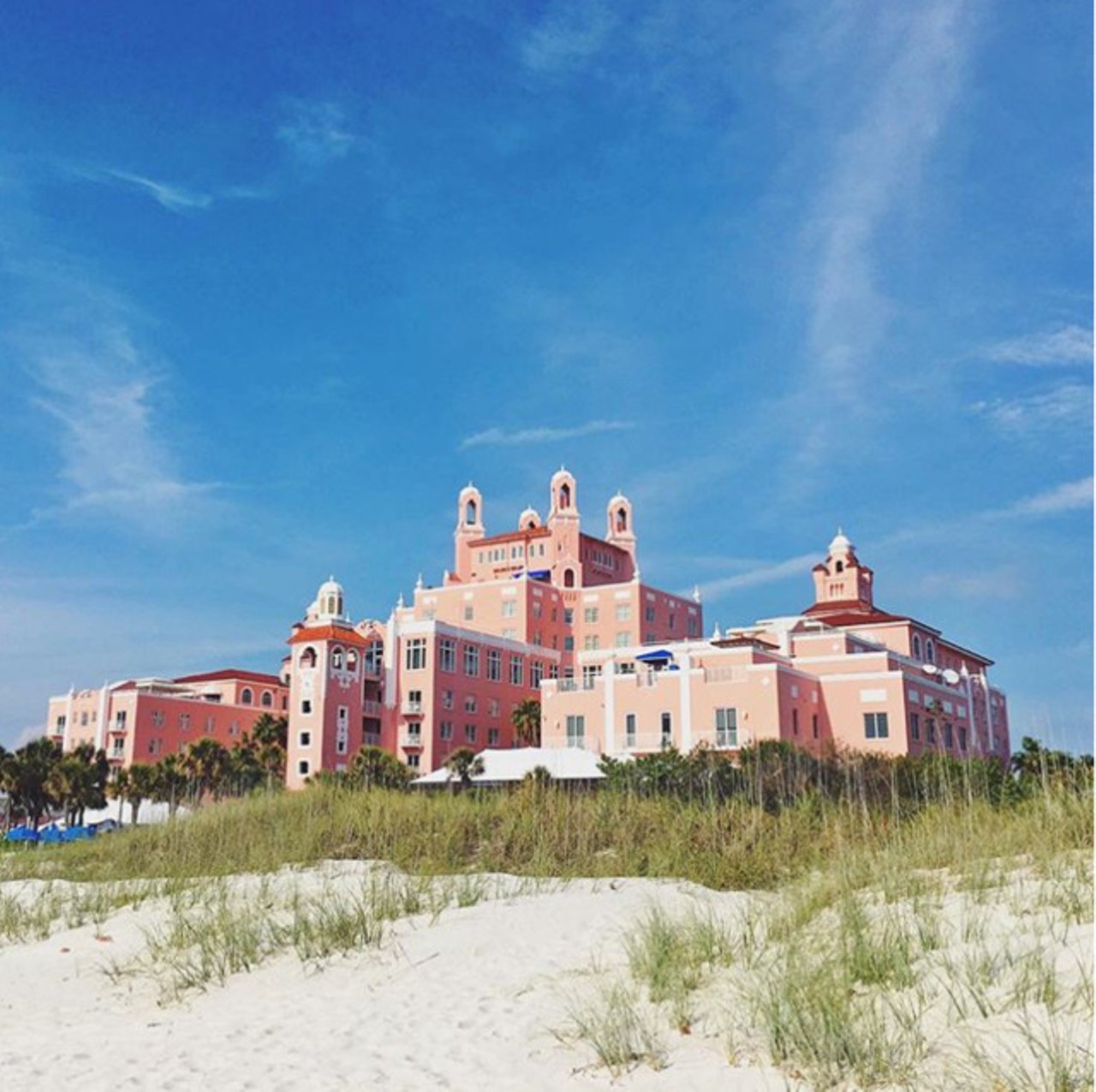   Relax at the massive pink landmark that is the Don CeSar 
The Don CeSar, 3400 Gulf Blvd, St Pete Beach, 727-360-1881
The Don CeSar, the unmistakable pink palace of St. Pete Beach, offers a luxurious stay, beautiful view of St. Pete Beach, and features a number of indulgent treatments and amenities in their Spa Oceana. Their beautiful rooftop terrace overlooking the Gulf of Mexico will have all of your visitors taking pictures at sunset. The Don CeSar is too iconic of a landmark for out-of-towners to skip on their site-seeing endeavors. 
Photo via  Don Cesar/Facebook