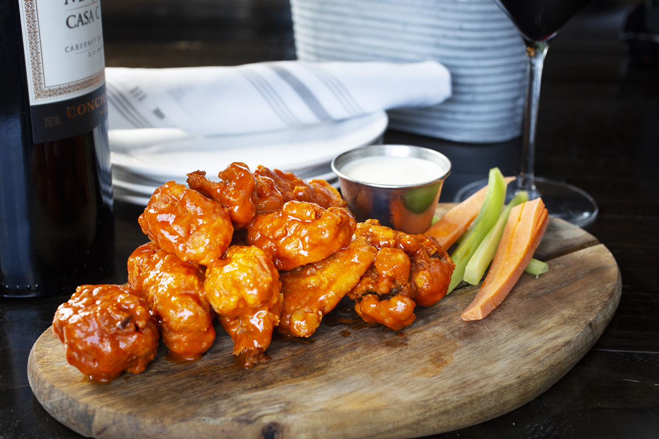 Opened in March, the new Seminole Heights restaurant's cauliflower buffalo bites arrive with a choice of house-made ranch or blue cheese.