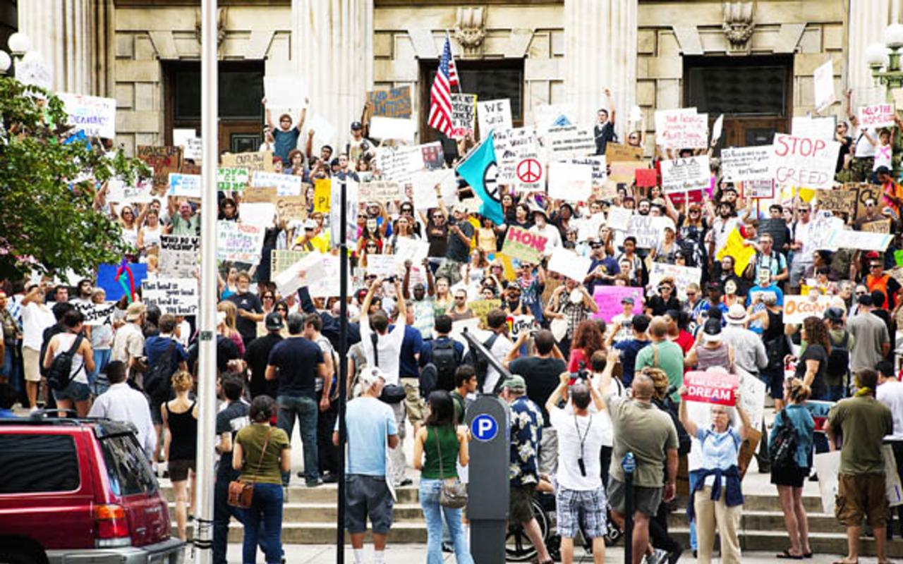STEPPING UP: Protesting on the steps of the federal courthouse Oct. 6.