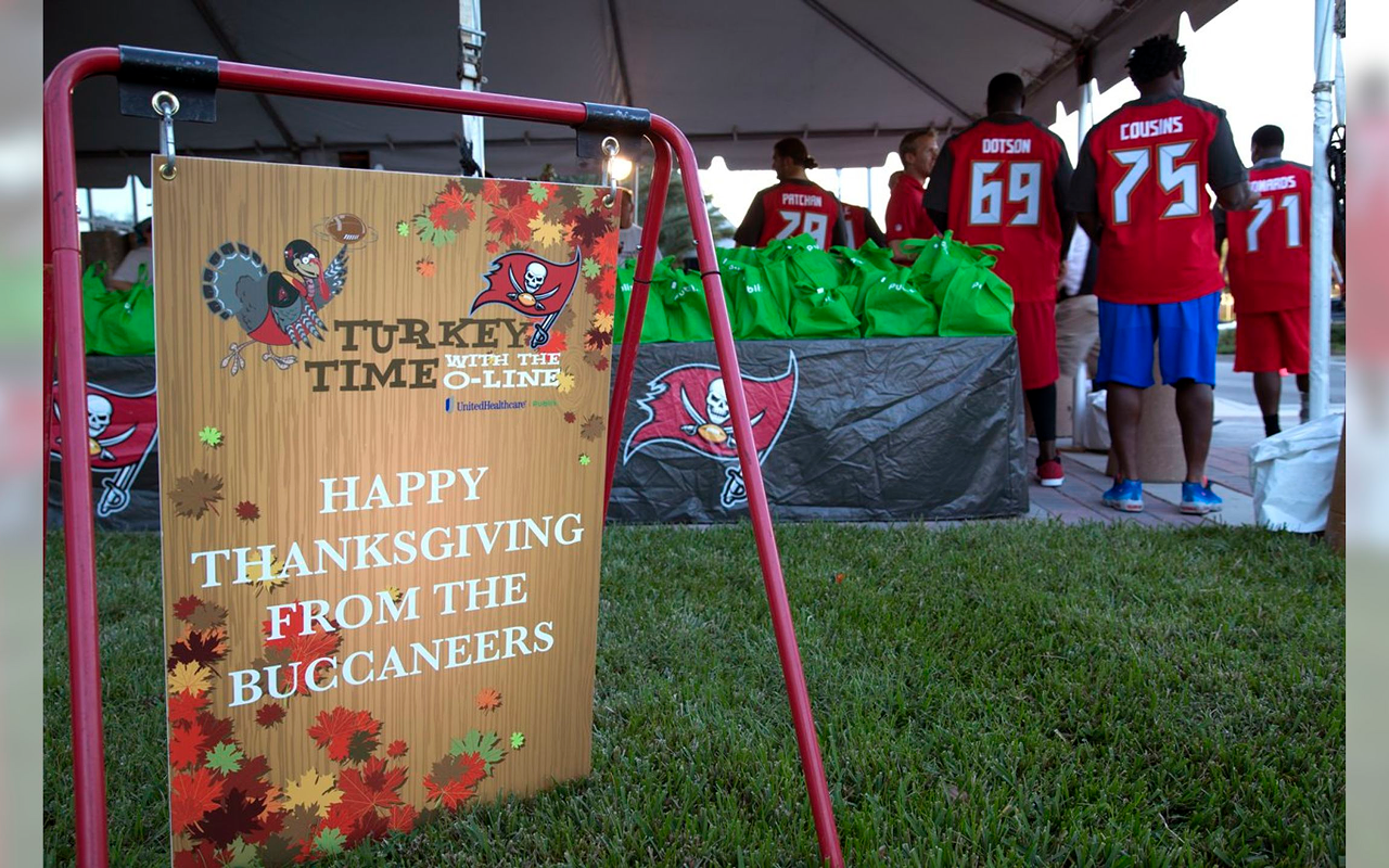 The Tampa Bay Bucs offensive line prepares to feed local families this Thanksgiving
