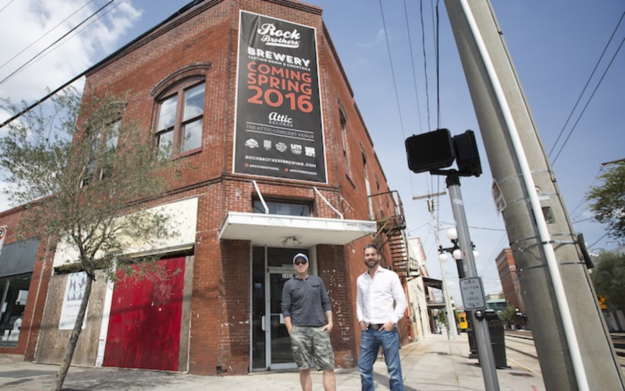 Rock Brothers' Kevin Lilly and Tony Casoria in front of the future home of Rock Brothers Brewery and The Attic.