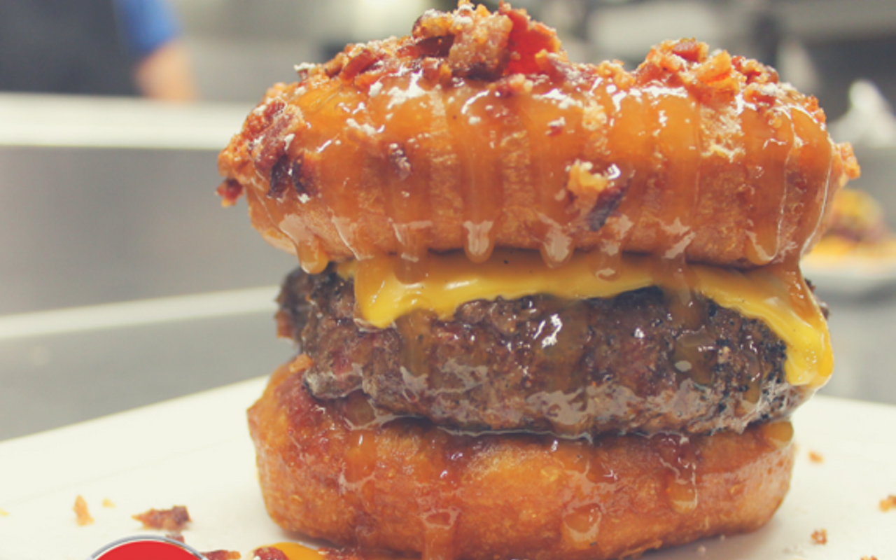 Beach's doughnut burger, with a beignet-style bun, American cheese, bacon and caramel sauce.