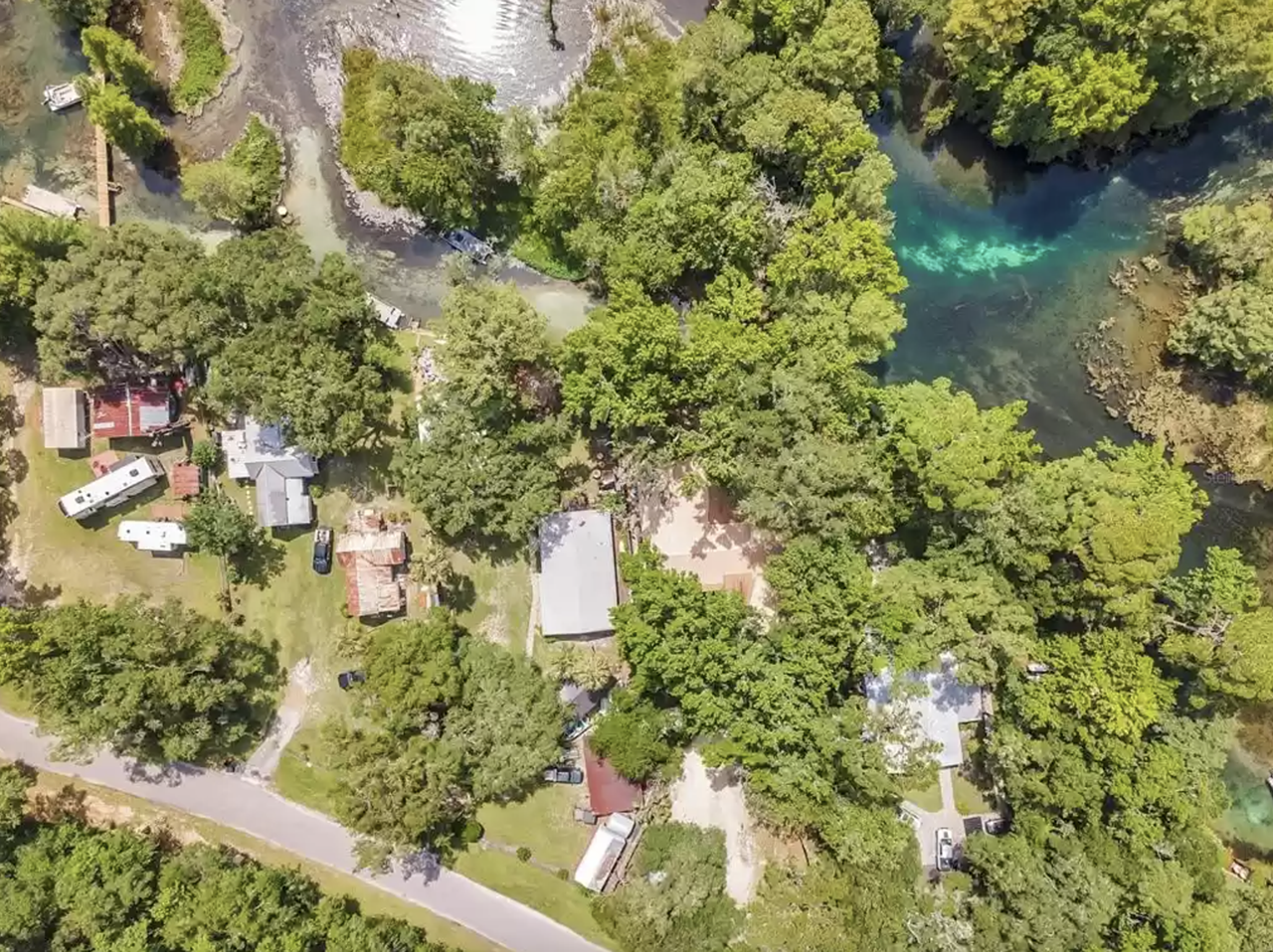 This Florida spring home on the Rainbow River comes with its own private island