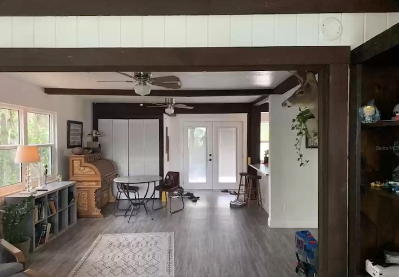 This Gulfport house comes with a giant oak tree growing through the kitchen