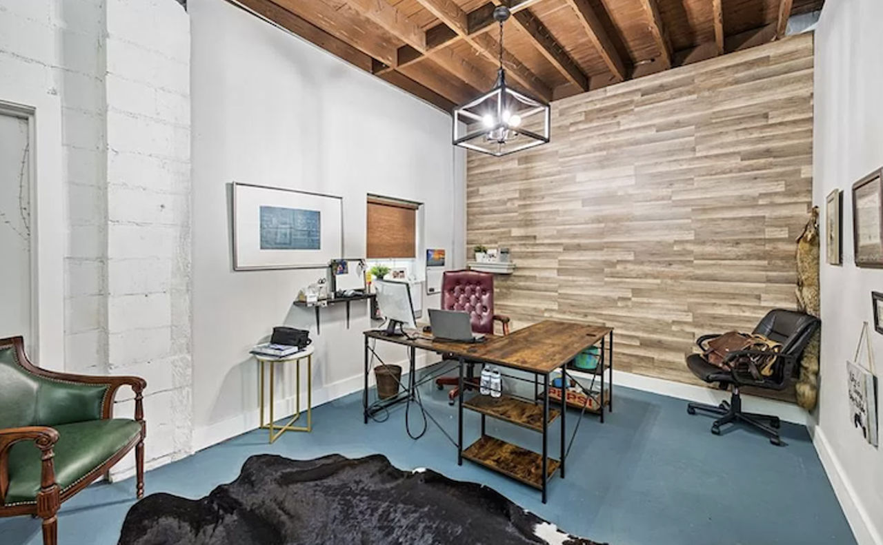 This historic Seminole Heights garage comes with a loft and a rooftop deck