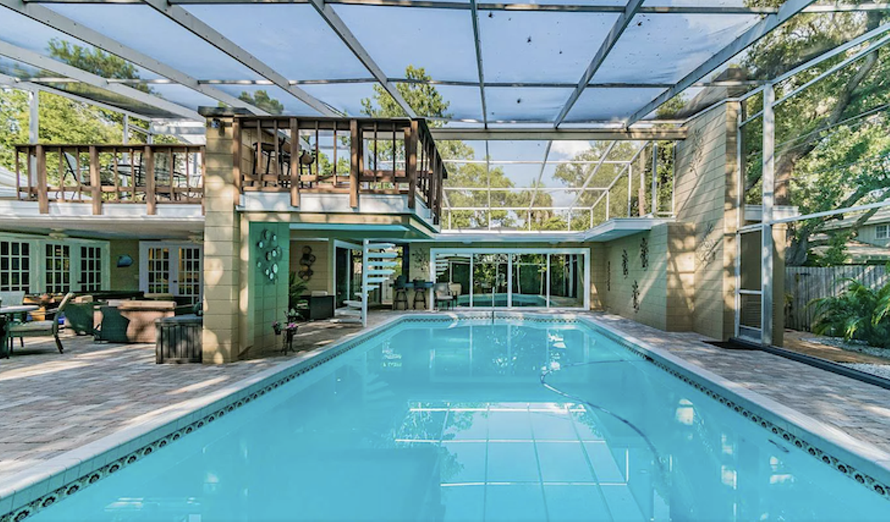This house for sale in St. Petersburg has a giant diving platform off the roof