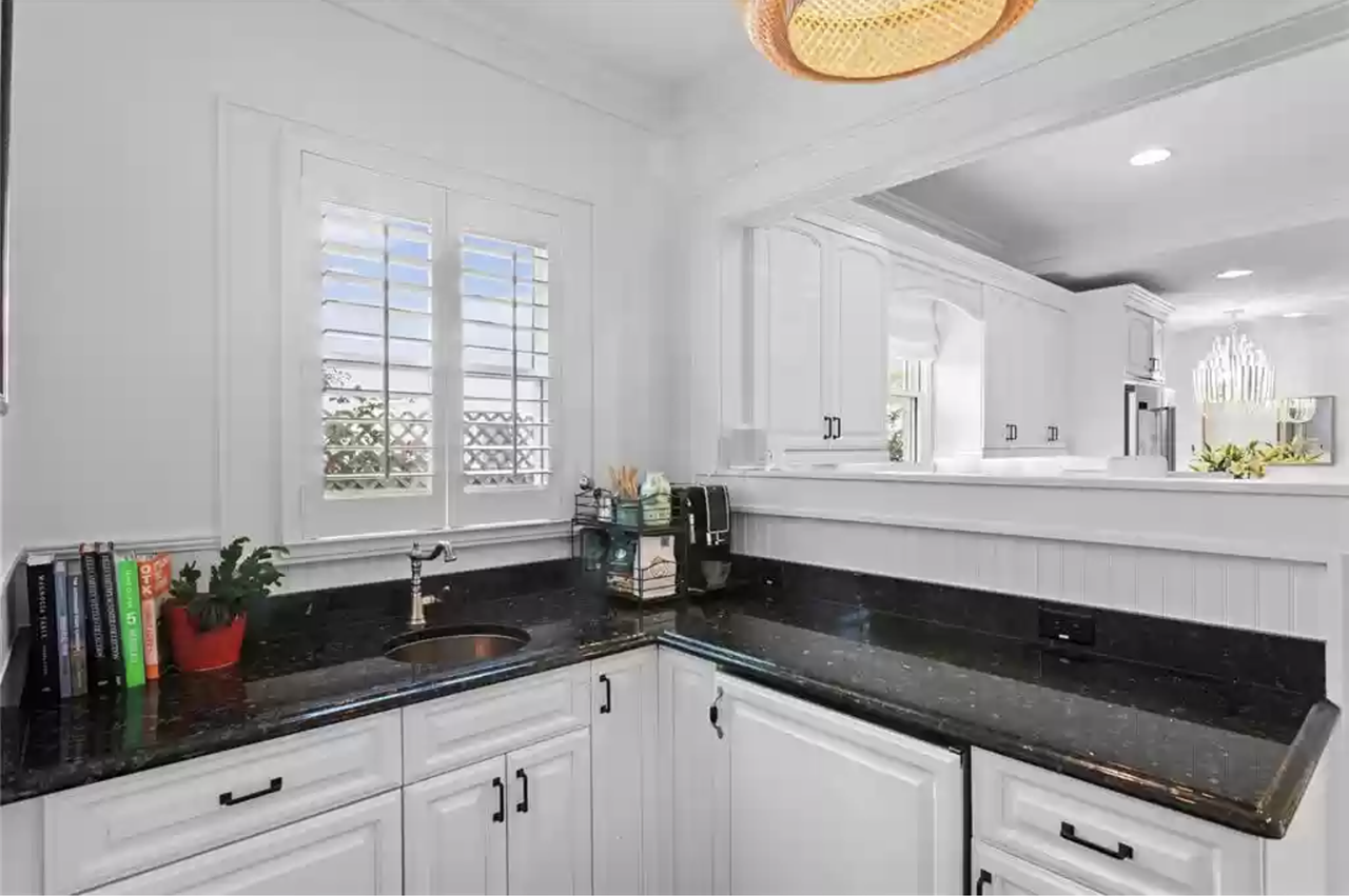 This St. Pete home in Historic Old Northeast comes with a hidden speakeasy behind a bookcase