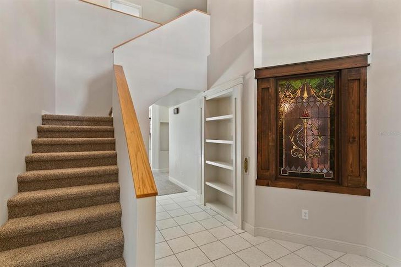 This Tampa Bay house comes with a hidden speakeasy behind a bookcase