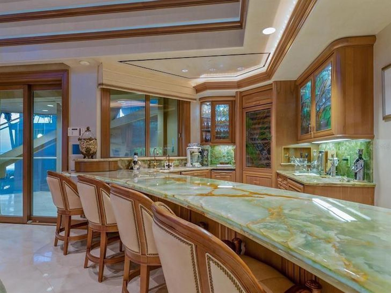 This Tampa Bay mansion looks like a '90s cruise ship, and comes with a waterslide on the roof