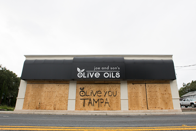 Joe & Sons Olive Oils on  Bay to Bay Boulevard boarded up in advance of the storm and left a message for the city of Tampa. - Chip Weiner