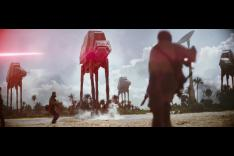 A ground-level view as AT-AT Walkers attack during the climactic battle in Rogue One. - Walt Disney Studios