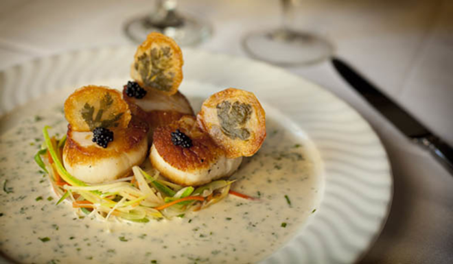 SIMPLY PERFECT: Chef Christopher Poix's scallops are expertly cooked. - Shanna Gillette