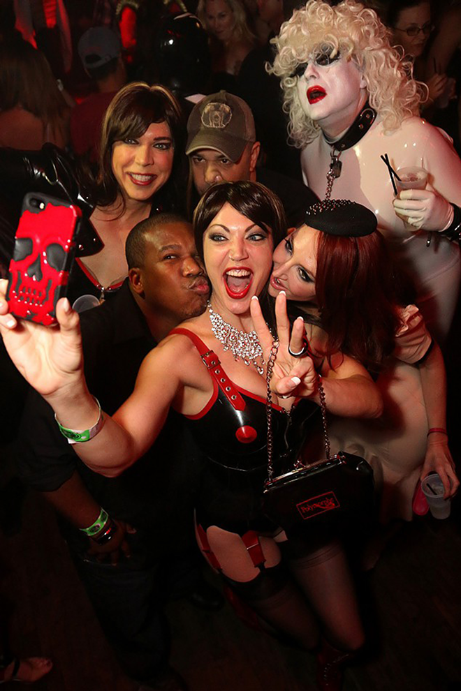 SELFIE ORGY: Fetishconists smile for the camera at last year's event. - DRUNKCAMERAGUY