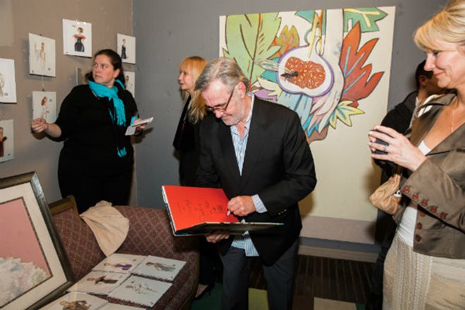 Vollbracht signing copies of his book, 'Nothing Sacred.' - © PEZZO PHOTO